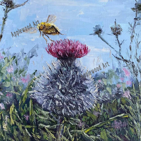 Large thistle flower with a bumblebee
