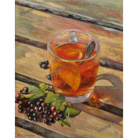 Black tea with lemon in a glass mug and blackcurrants fruit