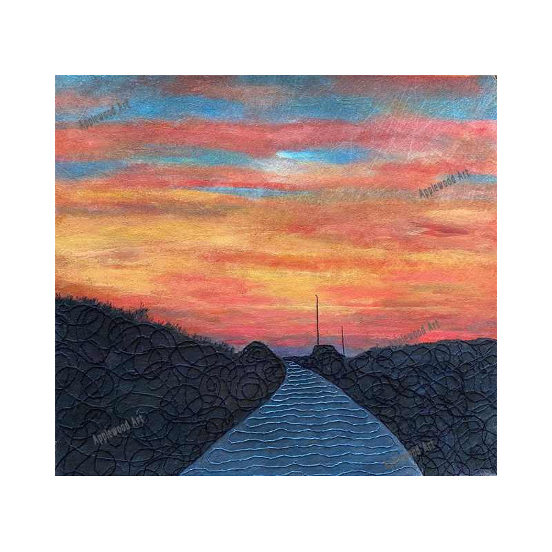 Country road in dramatic sunset